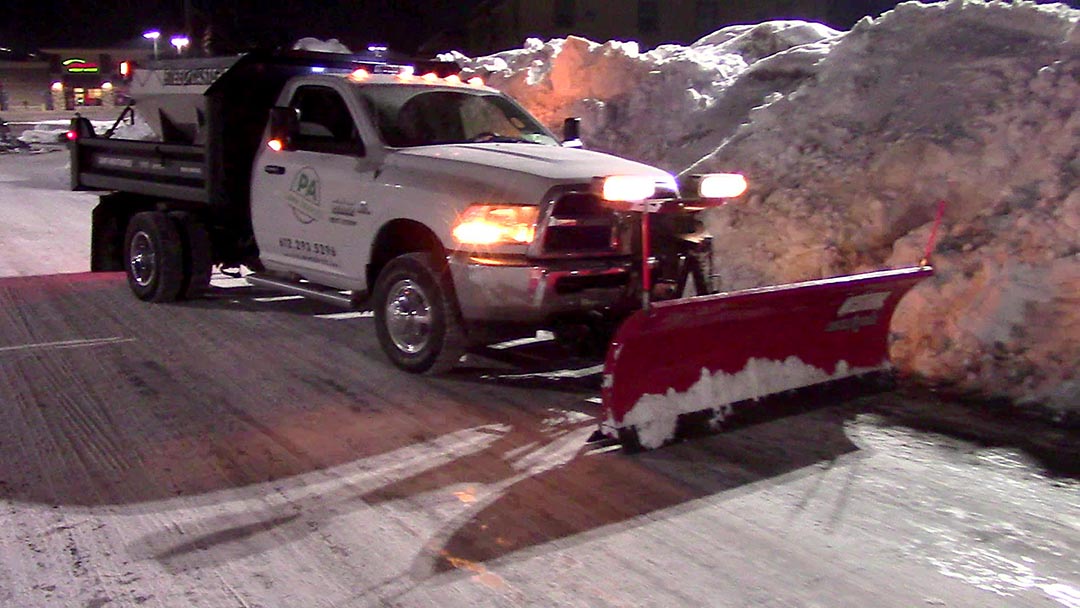 A commercial property being cleared of snow #3