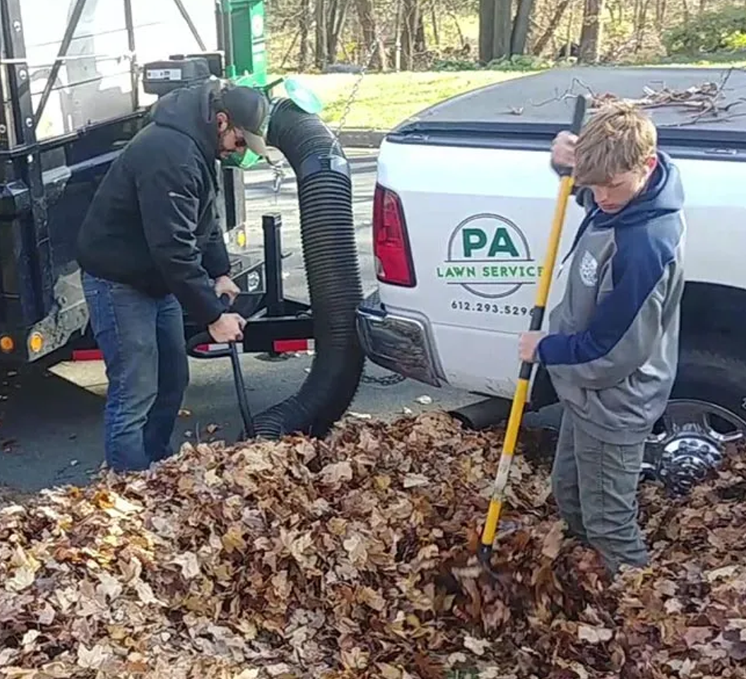 Lawn care professionals working