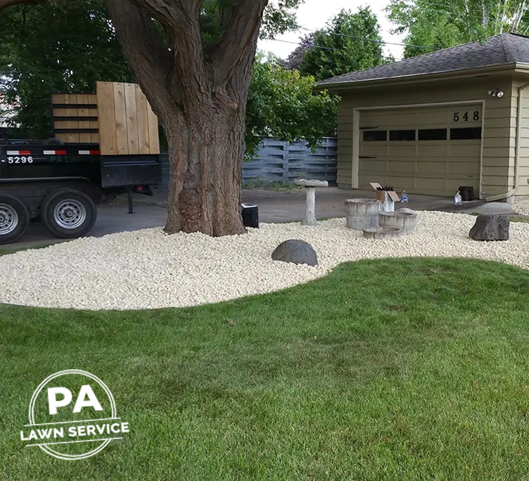 Two lawn care professionals